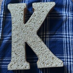 Monogrammed “k”